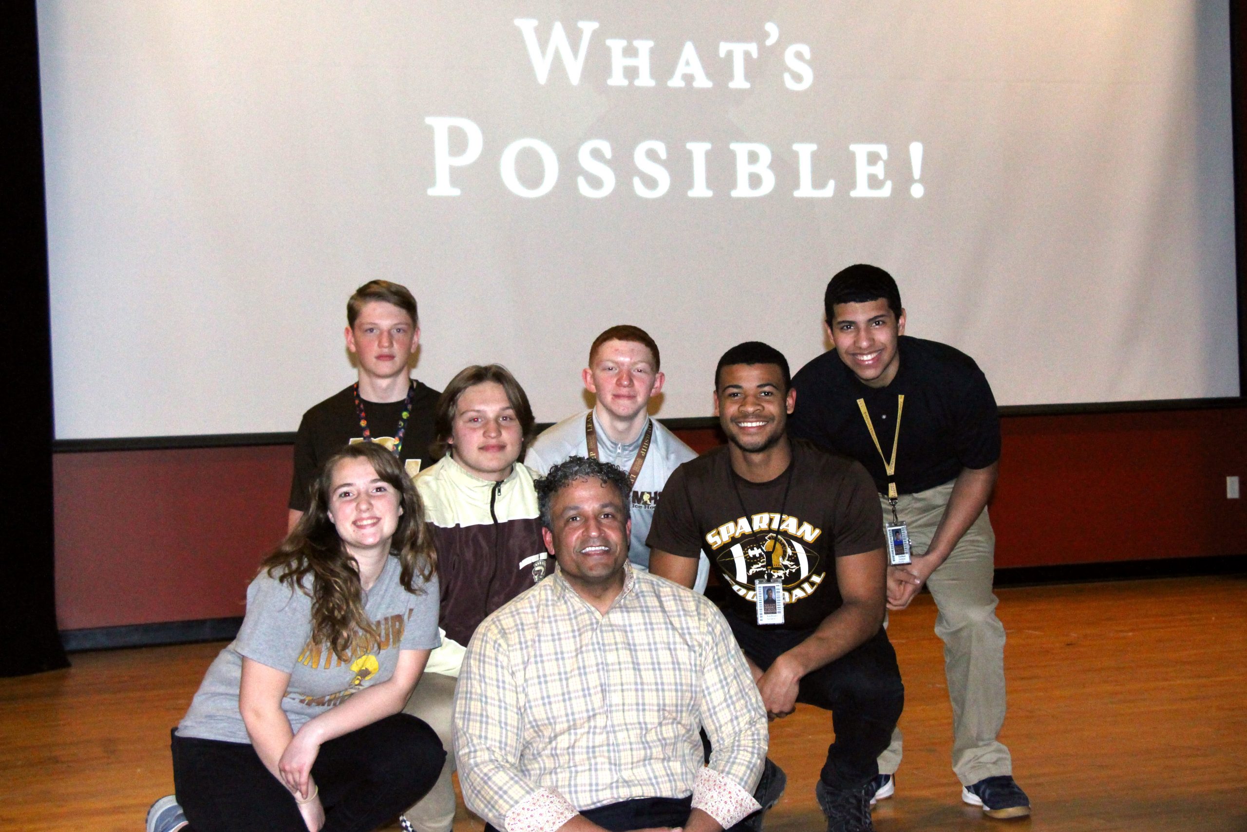 Author JT McCormick poses for a group photo with Milton Hershey School students during a recent visit to the school.